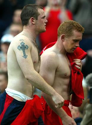 Wayne Rooney Cross Hand Tattoo