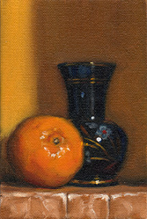 Oil painting of a mandarine beside a small glass vase painted with flowers.