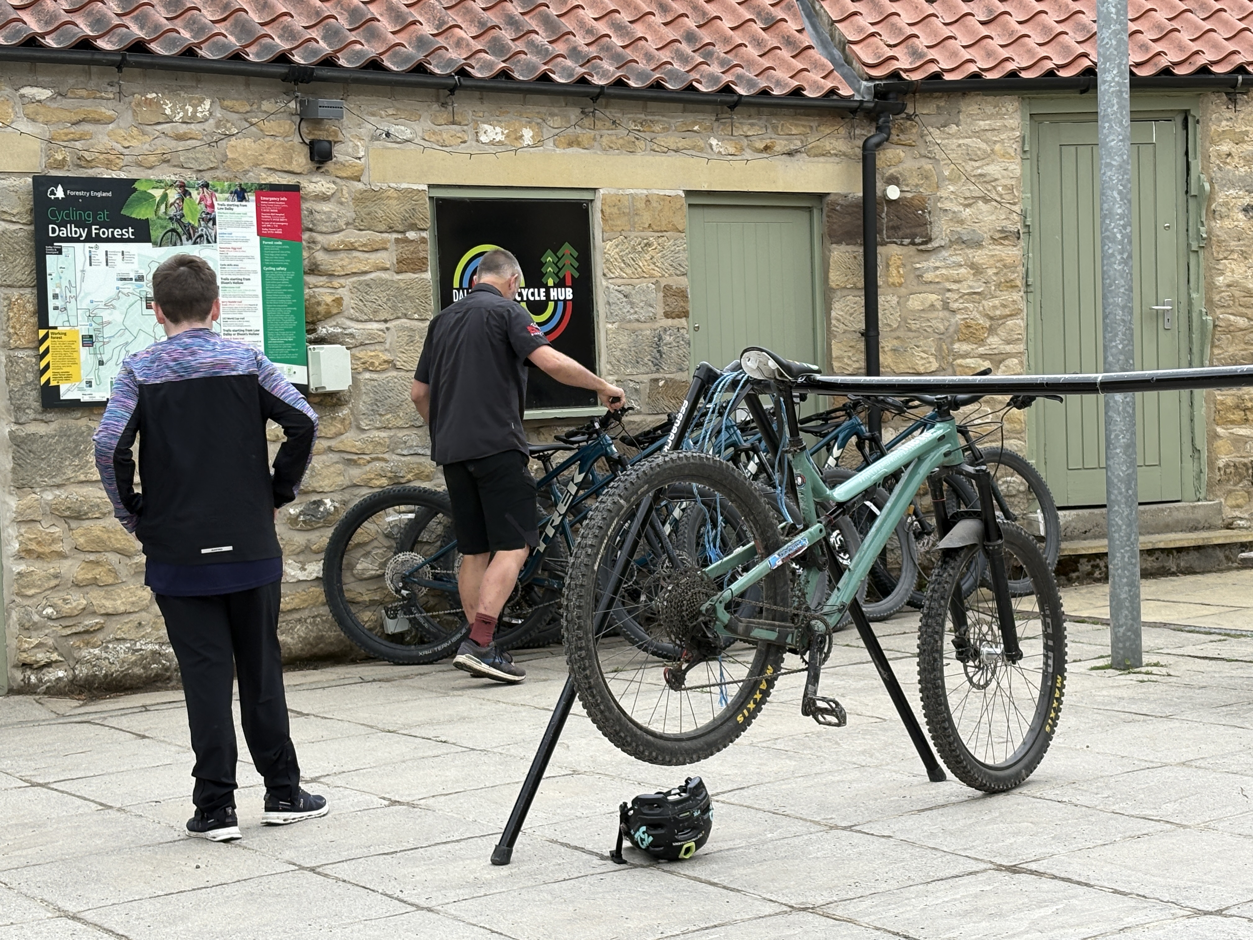 boy hiring a bike at Dalby Forest ready for family cycling