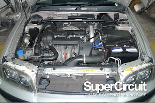 VOLVO V40 engine bay with the SUPERCIRCUIT Front Strut Bar installed.