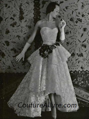 There are lots of 1950s prom dresses and evening gowns in pastel colors 