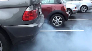 Pictures of vehicle smoke billowing out of the exhaust