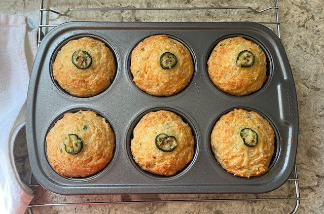 Food Lust People Love: Slightly spicy and oh so cheesy, these Jalapeño Cheddar muffins are fluffy inside with a little cheesy crunch on the outside. In short, they are delicious. Perfect for breakfast OR snack time. They are also a great accompaniment for soup!