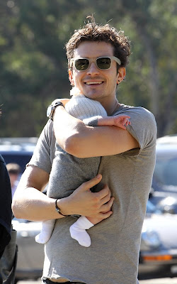 Orlando Bloom out with baby Flynn