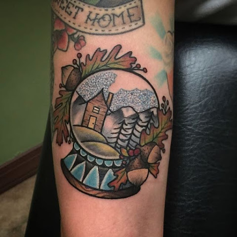 Keep Your Memories Encased In These Glinting Snow Globe Tattoos