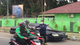 Peduli Covid-19, PWI Banten Bagikan Masker Kepada Pengguna Jalan