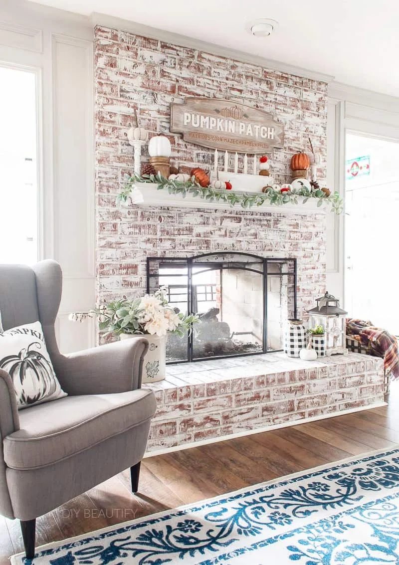 whitewash fireplace and fall mantel