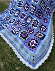 Blue and purple granny square crochet blanket