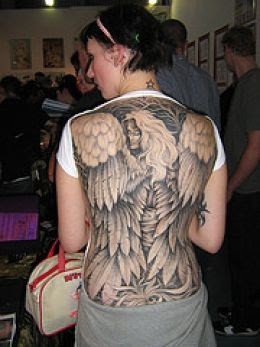 angel tattoo on Grils Back Body