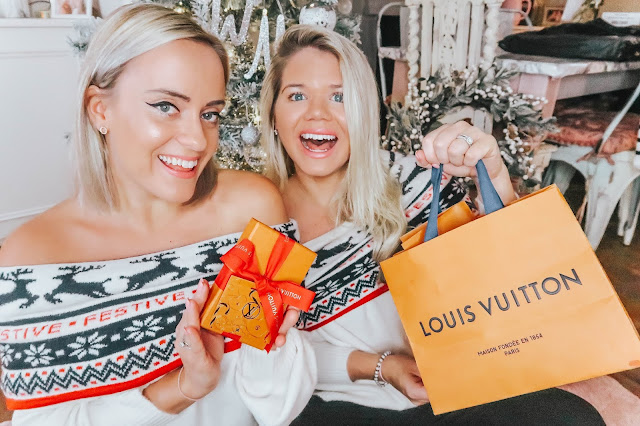 whitney and megan in christmas jumpers with louis vuitton