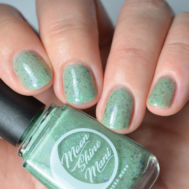 green nail polish with flakies