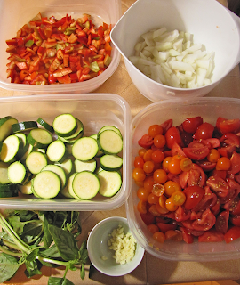 Containers of Chopped Onion, Garlic, Tomatoes, Zucchini, with Basil