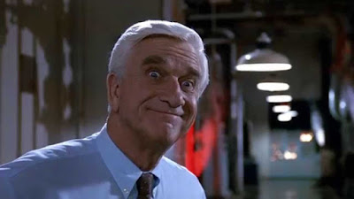 The Naked Gun 1988 movie still Leslie Nielsen