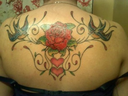 Labels Flower Tattoo Designs on Back