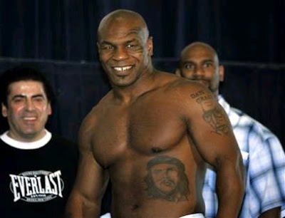 Checkout these pictures of boxing great Mike Tyson and his tattoos.