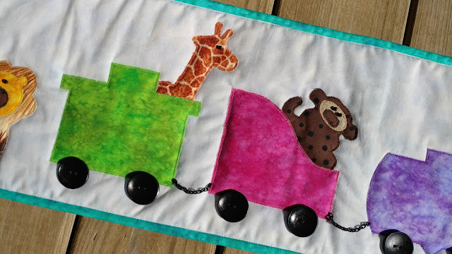 Row by Row On the Go using AccuQuilt Go dies for train and animals