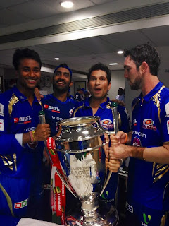 Sachin with Champion League trophy