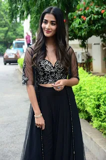 Actress Pooja Hegde Stills in black dress at Valmiki movie Press Meet