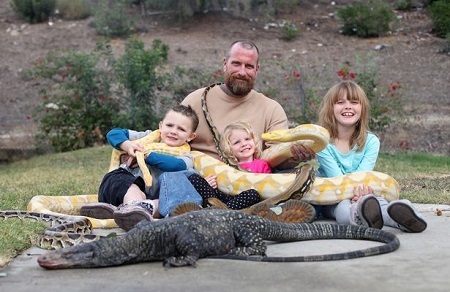 Shocking! Father of Three Allows His Kids Play With His Huge 19ft Pet Python (Photos)