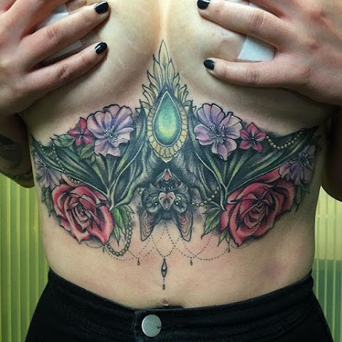 10 Bold Stomach and Sternum Bat Tattoos