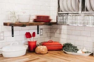 Corner shelving that can sweep all worries related to the question of ''how to style open shelving in your kitchen'' away.