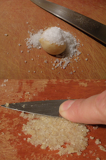 Demo of mincing and crushing garlic with salt