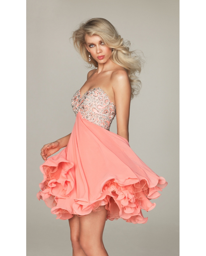 ... gives this short coral prom dress a touch of sparkle a beautiful short