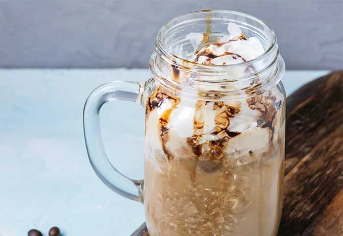 How to make an easy skinny mocha frappe recipe just like McDonald's at home. This healthy iced frozen coffee drink drinks can be keto, dairy free, or vegan with almond milk. Make it low carb and sugar free with coconut sugar or liquid stevia. Add chocolate in this healthy homemade frozen coffee. How to make a mocha frappuccino at home. #mocha #coffee