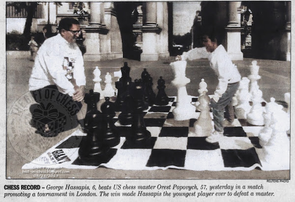 George Hassapis, 6, beats US chess master Orest Popovych, 57, yesterday in a match promoting a tournament in London. The win made Hassapis the youngest player ever to defeat a master.