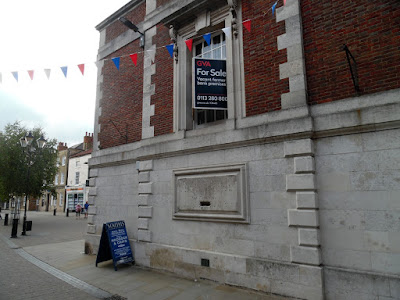 A 'for sale' sign on the now-closed NatWest Bank in Brigg in 2018 - picture on Nigel Fisher''s Brigg Blog