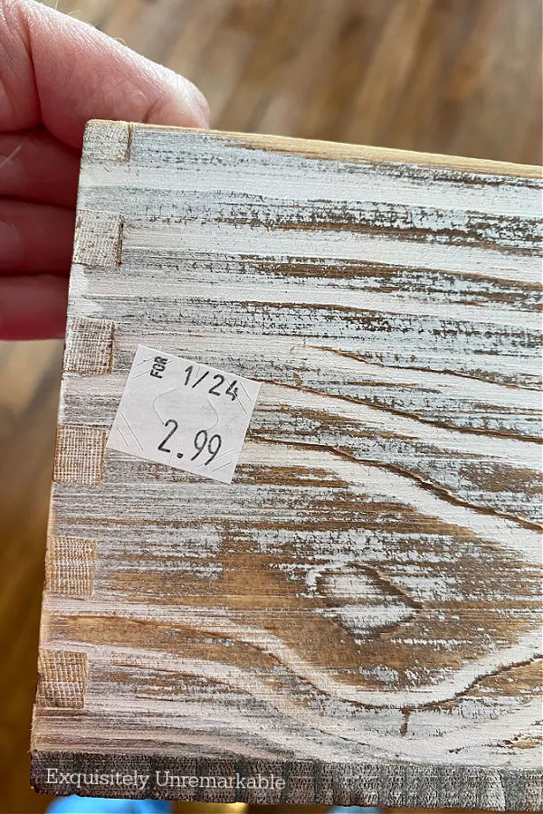 $2.99 price tag on a whitewashed wooden thrift store box