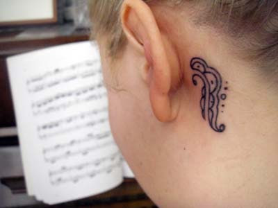 And then the ear tattoo I LUV it too