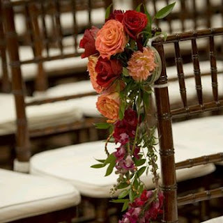 Wedding chairs decorated with flowers