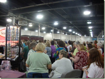 gathering to watch Greg give away prizes