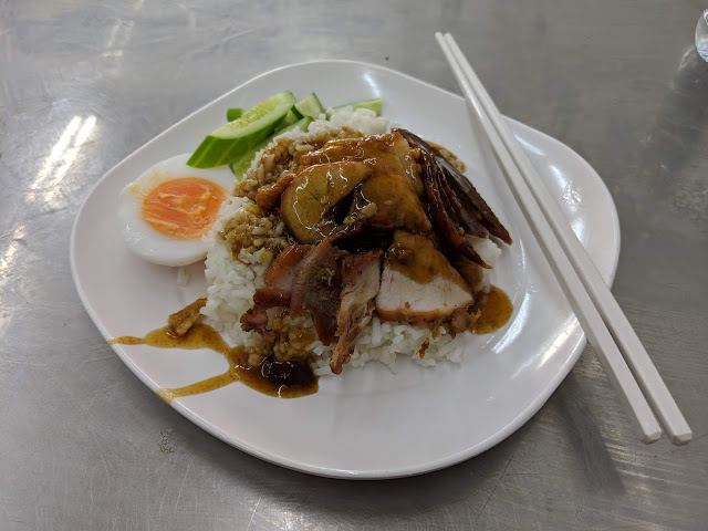 Crackling roast pork and rice for breakfast in Bangkok, Thailand