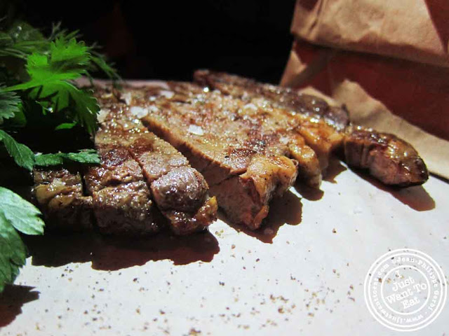 Image of Ribeye, fries and bearnaise sauce at Courgette next to Dream Hotel Midtown in NYC, New York