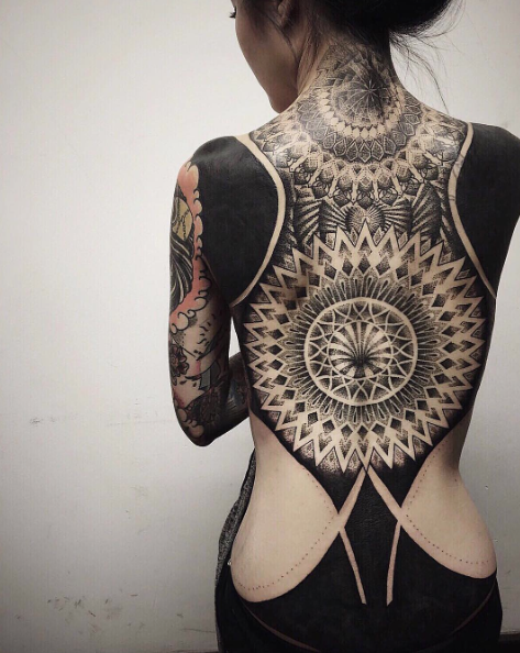 tribal art blackout tattoo