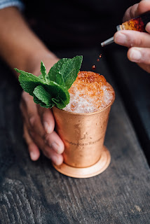 Bartender making a cocktail topicintrends