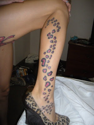 spotted tattoo design with foot tattoo art