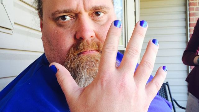 Man with fingernail polish