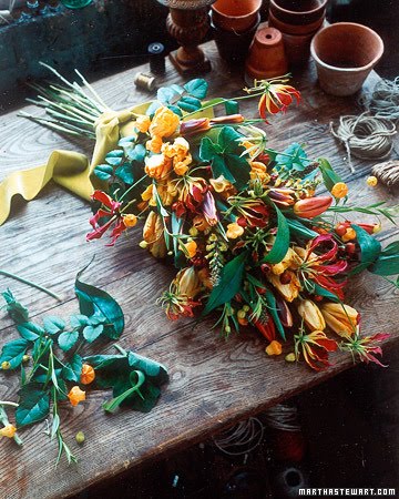 Yellow lupin are sprinkled throughout the asymmetrical cascade tied in 