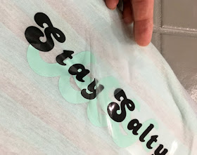 Add a beachy saying to a plain t-shirt with Cricut Iron On Vinyl and an Easy Press!