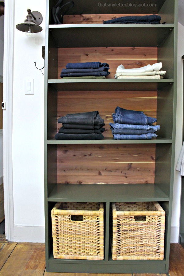walk-in closet makeover with built-in shelves and baskets