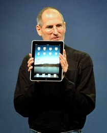 Steve Jobs with the first iPad