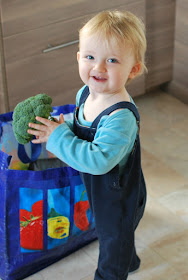 Picture of toddler with broccolli