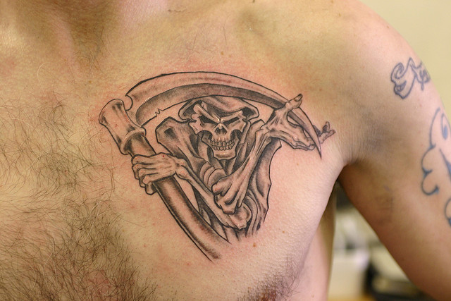 The seventh of my Grim Reaper Tattoo Designs is this stunning chest tattoo