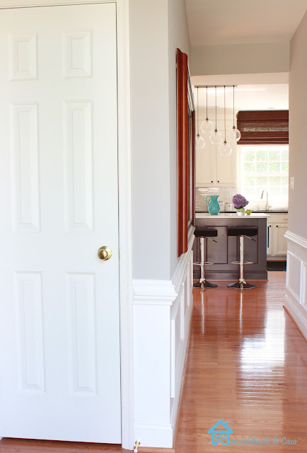 kitchen in the far with closet door closed