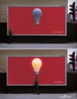 man under light bulb with and without lit