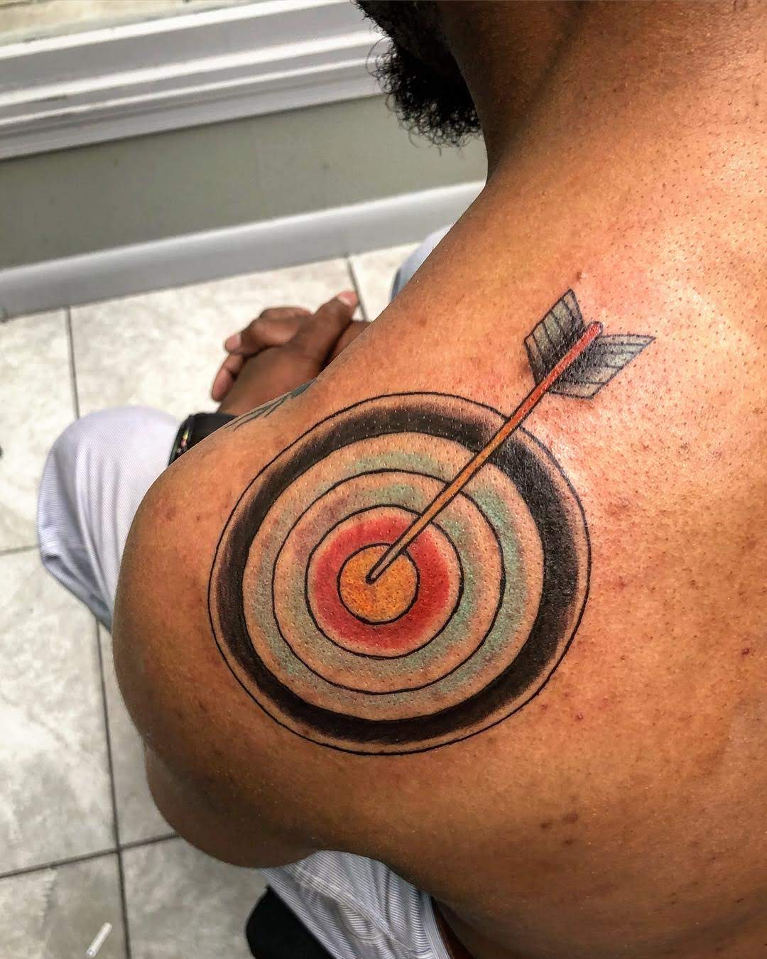 Bulls eye Tattoo With Bow