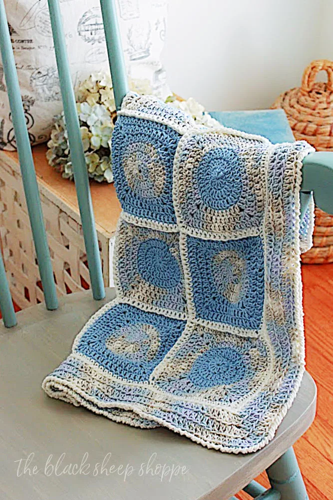 Granny squares crocheted into blanket.
